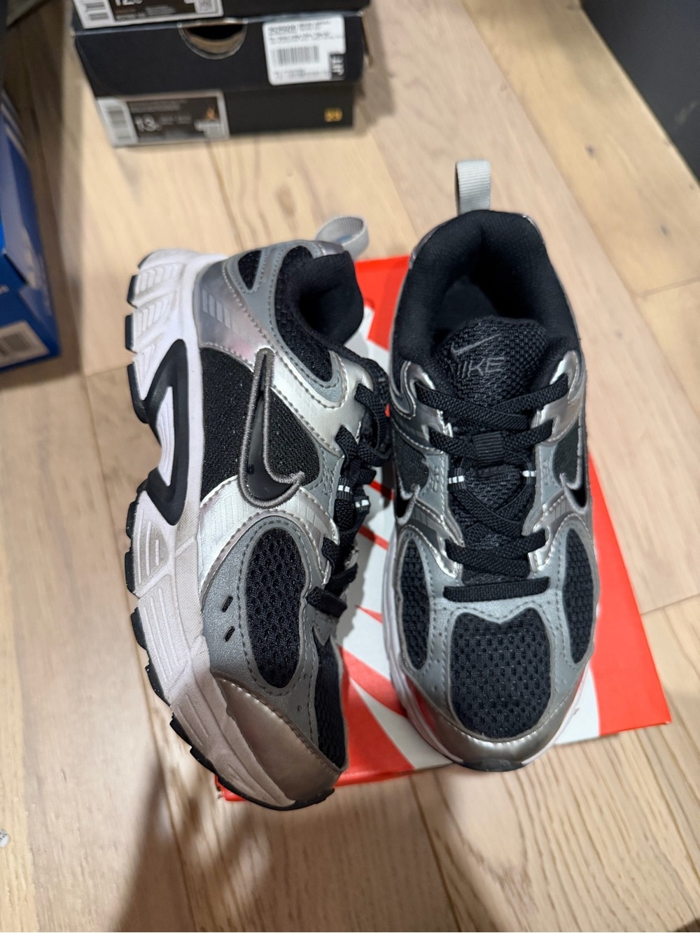 Nike Kids Black and Silver Athletic Sneakers with Mesh Panels